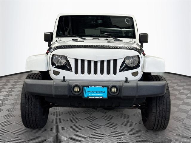 used 2014 Jeep Wrangler Unlimited car, priced at $17,364