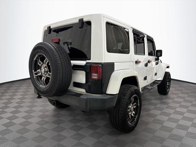 used 2014 Jeep Wrangler Unlimited car, priced at $17,364