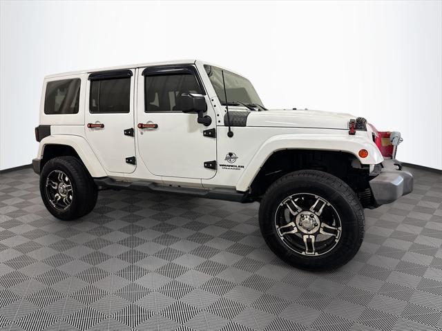 used 2014 Jeep Wrangler Unlimited car, priced at $17,364
