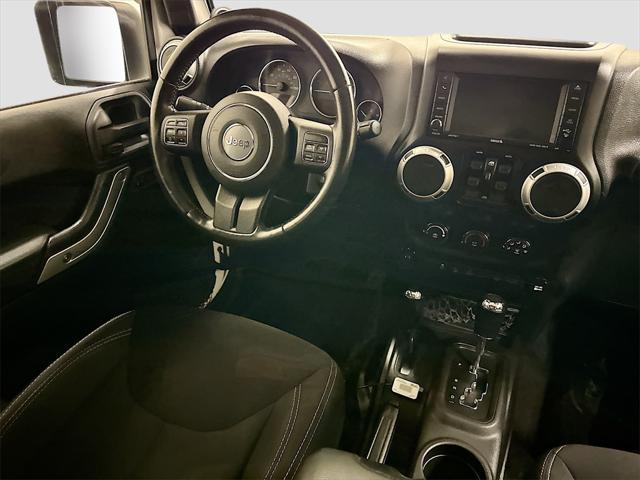 used 2014 Jeep Wrangler Unlimited car, priced at $17,364