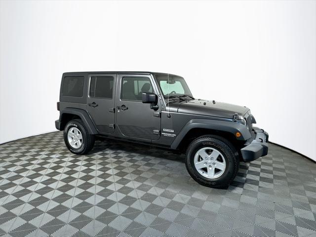 used 2017 Jeep Wrangler Unlimited car, priced at $23,422