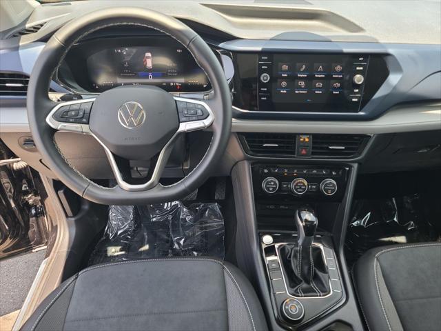used 2024 Volkswagen Taos car, priced at $26,100