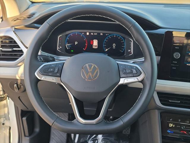 new 2025 Volkswagen Taos car, priced at $34,421