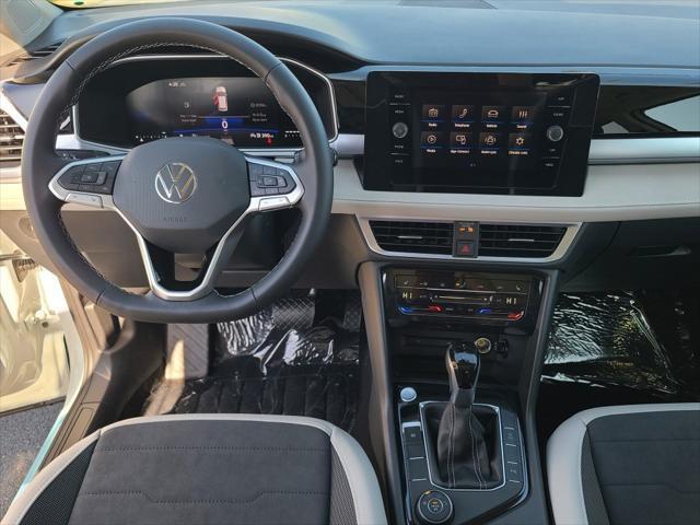 new 2025 Volkswagen Taos car, priced at $30,379