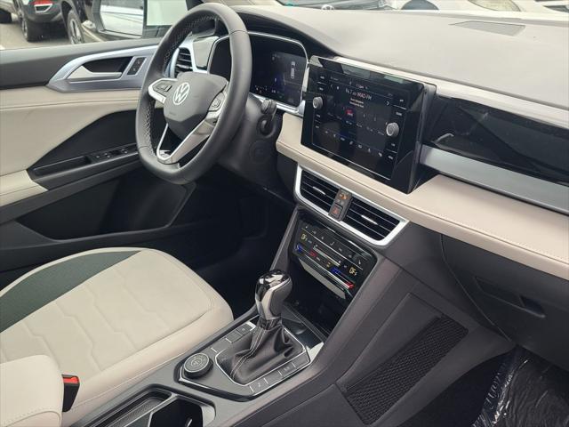 new 2025 Volkswagen Taos car, priced at $30,552