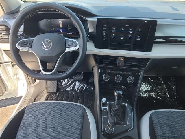 new 2025 Volkswagen Taos car, priced at $26,677