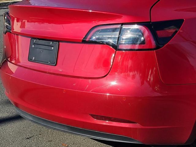 used 2022 Tesla Model 3 car, priced at $18,500