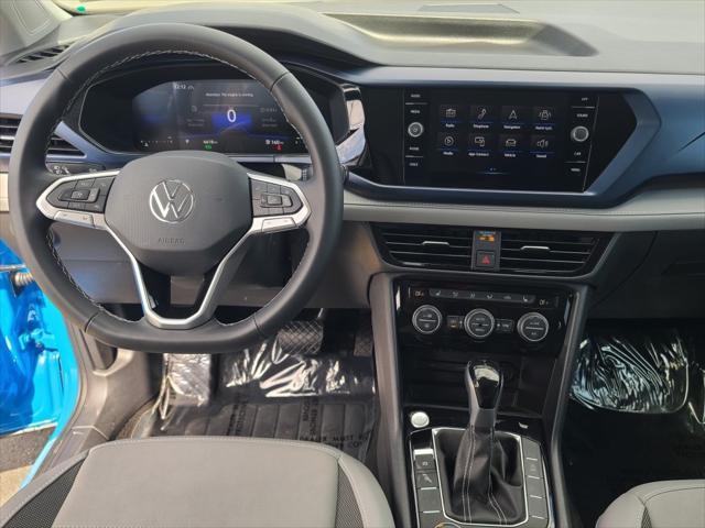 used 2024 Volkswagen Taos car, priced at $24,899