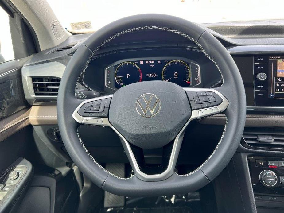 new 2024 Volkswagen Taos car, priced at $33,191