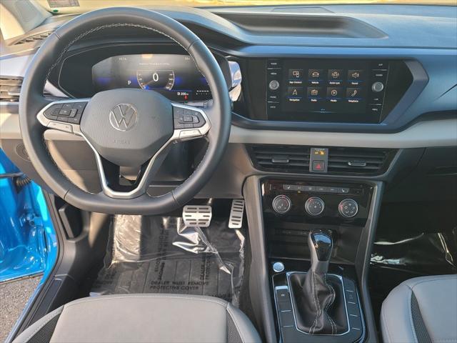 used 2023 Volkswagen Taos car, priced at $22,484