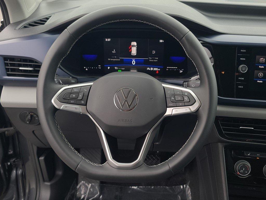used 2023 Volkswagen Taos car, priced at $19,900