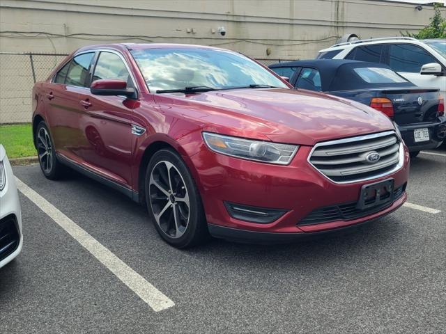 used 2015 Ford Taurus car, priced at $11,000
