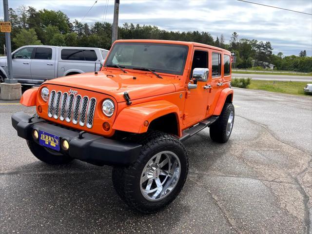 used 2012 Jeep Wrangler Unlimited car, priced at $21,995