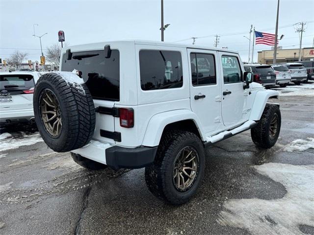 used 2012 Jeep Wrangler Unlimited car, priced at $22,389