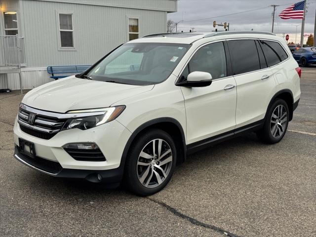 used 2018 Honda Pilot car, priced at $22,922