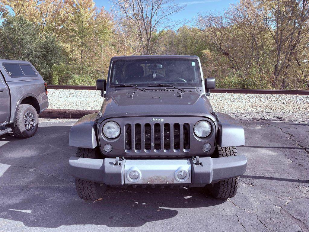 used 2014 Jeep Wrangler Unlimited car, priced at $16,225
