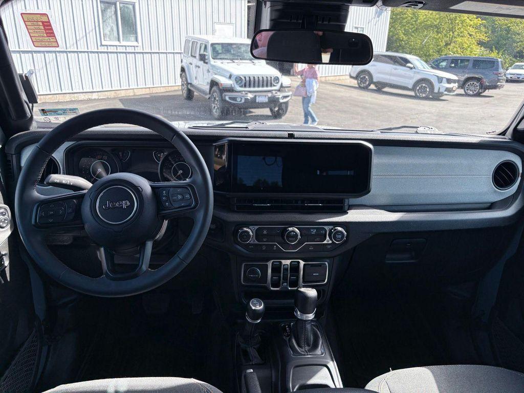 used 2024 Jeep Wrangler car, priced at $33,600