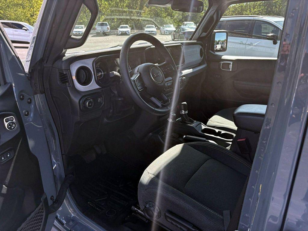 used 2024 Jeep Wrangler car, priced at $33,600
