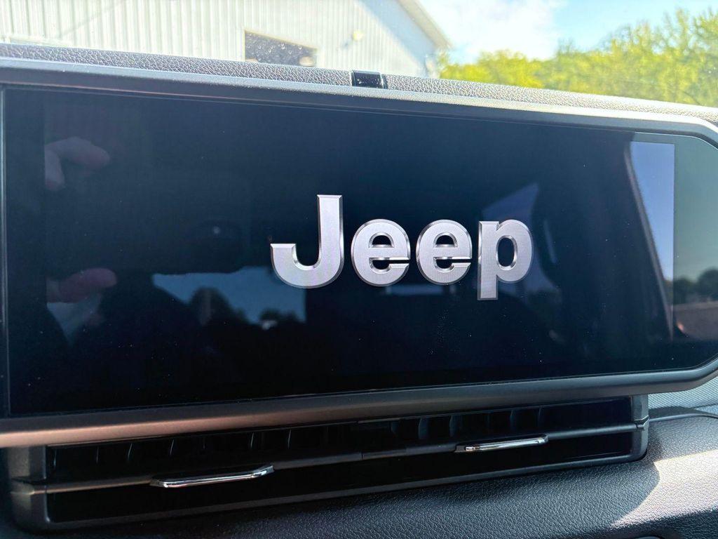 used 2024 Jeep Wrangler car, priced at $33,600