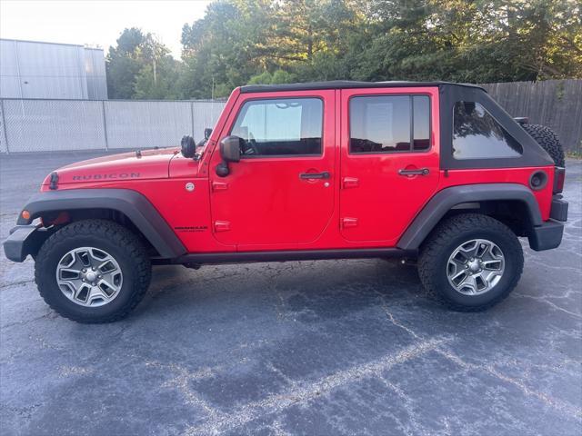 used 2014 Jeep Wrangler Unlimited car, priced at $26,995