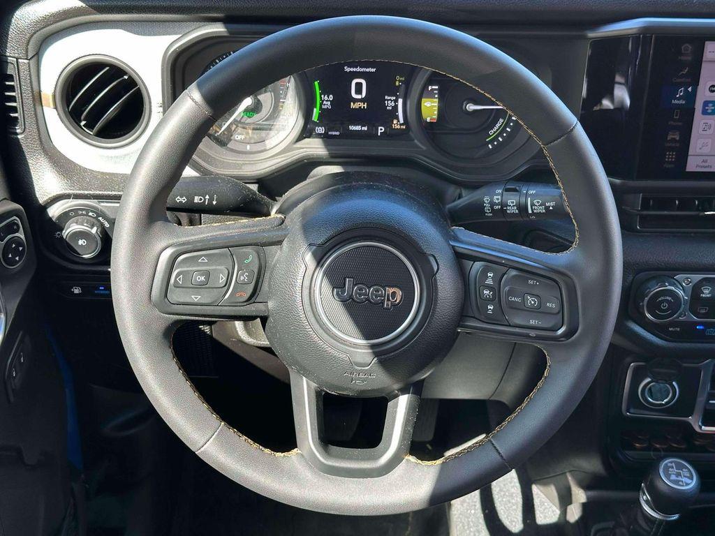 used 2024 Jeep Wrangler 4xe car, priced at $32,591