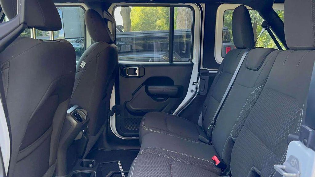 used 2021 Jeep Wrangler Unlimited car, priced at $33,991