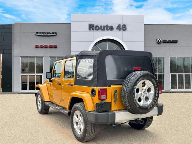 used 2014 Jeep Wrangler Unlimited car, priced at $21,991