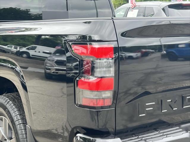 used 2025 Nissan Frontier car, priced at $33,991