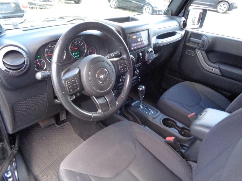used 2014 Jeep Wrangler Unlimited car, priced at $18,995