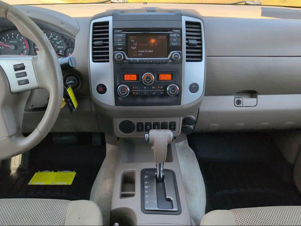 used 2015 Nissan Frontier car, priced at $10,988