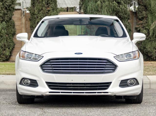 used 2015 Ford Fusion Hybrid car, priced at $9,899