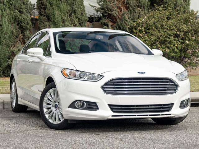 used 2015 Ford Fusion Hybrid car, priced at $9,899