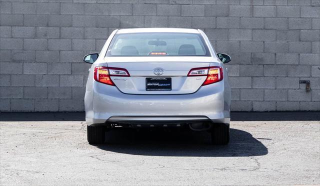 used 2013 Toyota Camry car, priced at $13,999