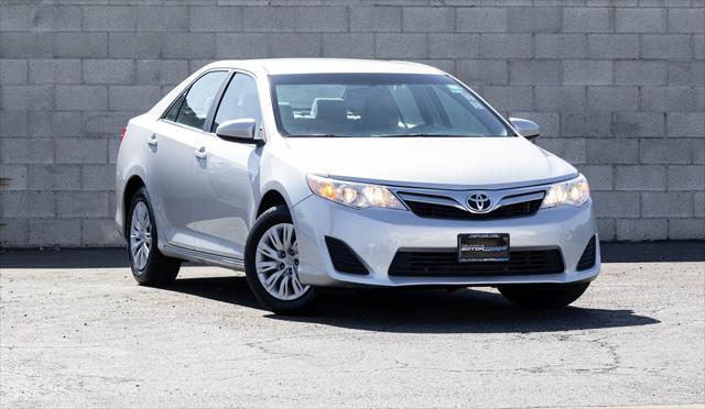 used 2013 Toyota Camry car, priced at $13,999