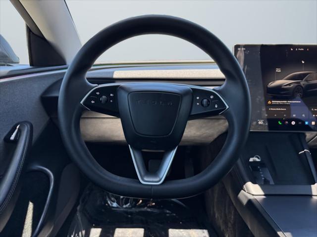 used 2024 Tesla Model 3 car, priced at $31,699