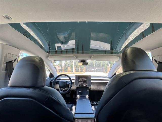 used 2024 Tesla Model 3 car, priced at $31,699