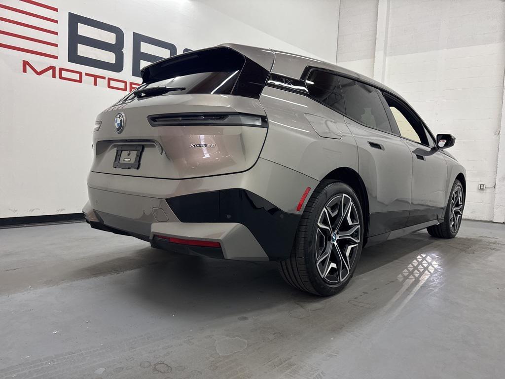 used 2024 BMW iX car, priced at $52,900