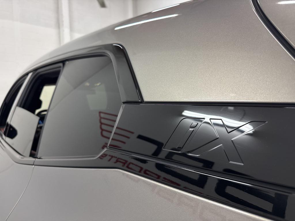 used 2024 BMW iX car, priced at $52,900