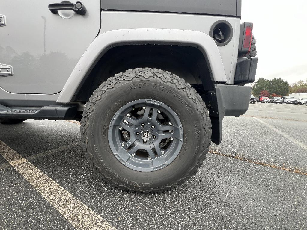 used 2014 Jeep Wrangler Unlimited car, priced at $19,393