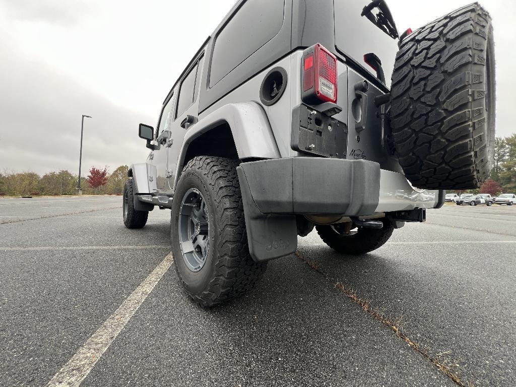 used 2014 Jeep Wrangler Unlimited car, priced at $19,393