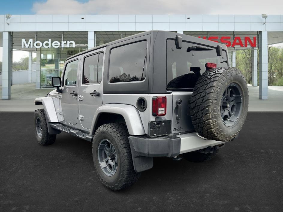 used 2014 Jeep Wrangler Unlimited car, priced at $19,393