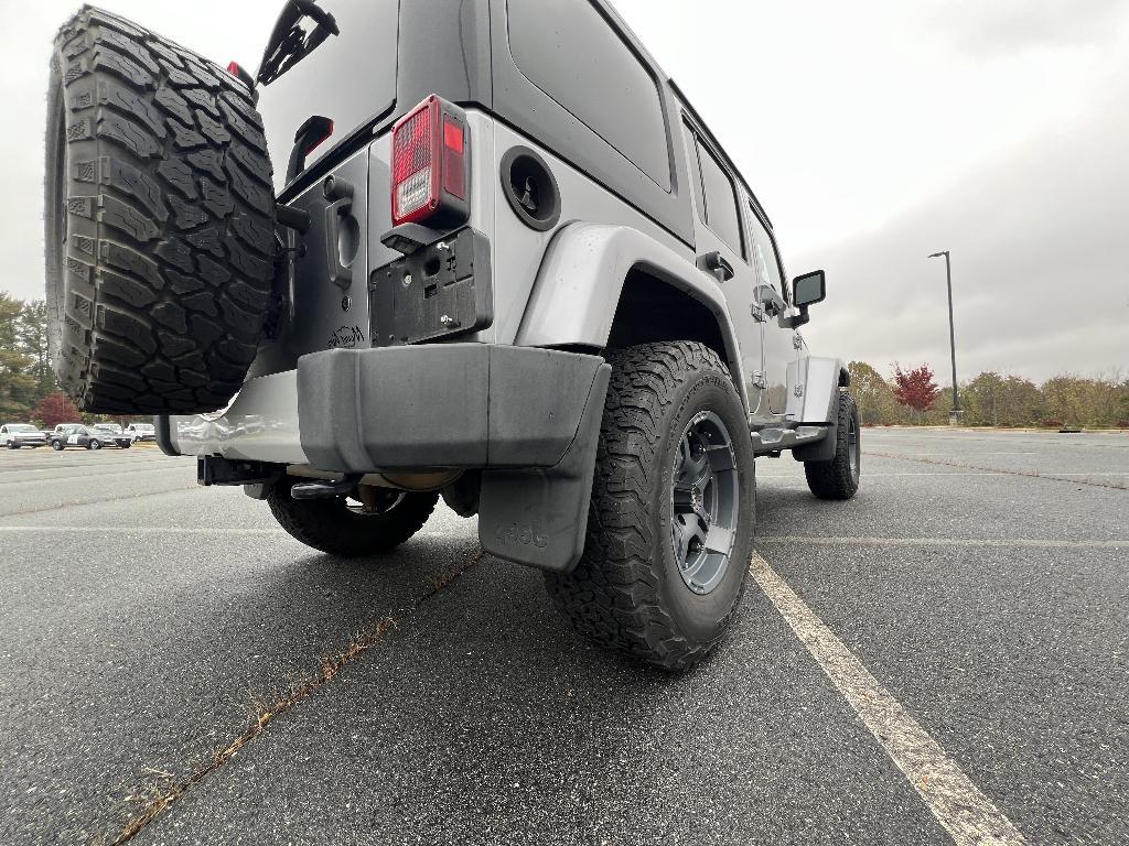 used 2014 Jeep Wrangler Unlimited car, priced at $19,393