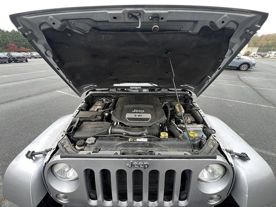 used 2014 Jeep Wrangler Unlimited car, priced at $19,393