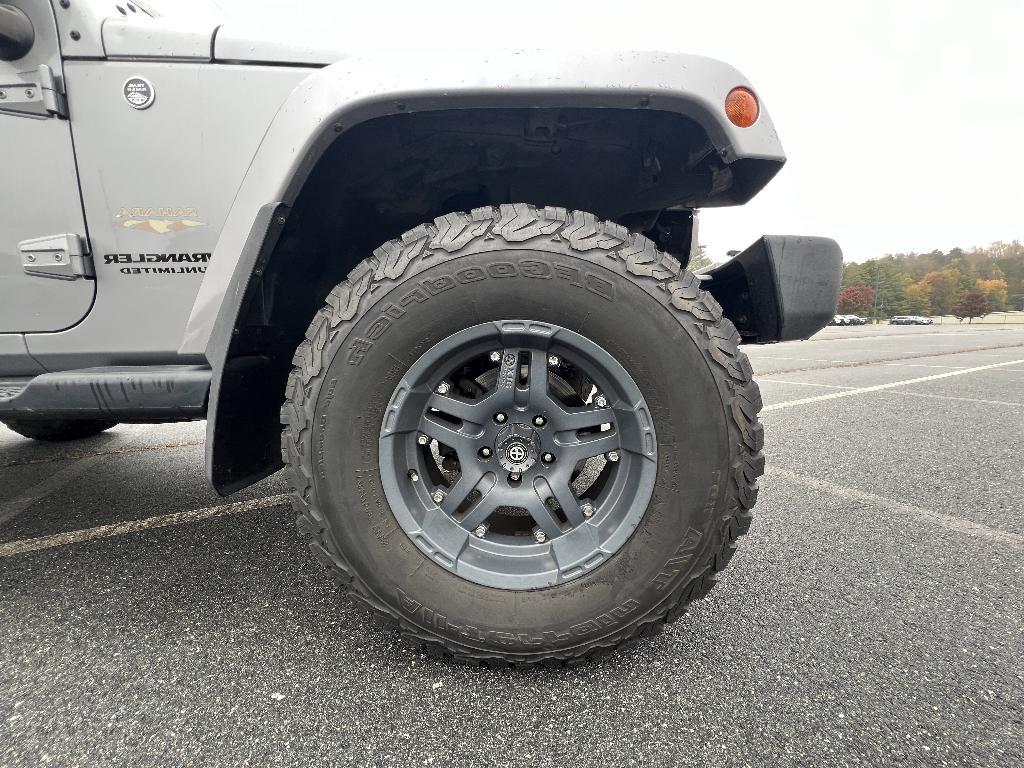 used 2014 Jeep Wrangler Unlimited car, priced at $19,393