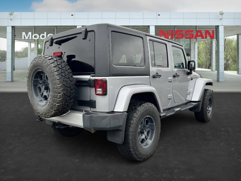 used 2014 Jeep Wrangler Unlimited car, priced at $19,393