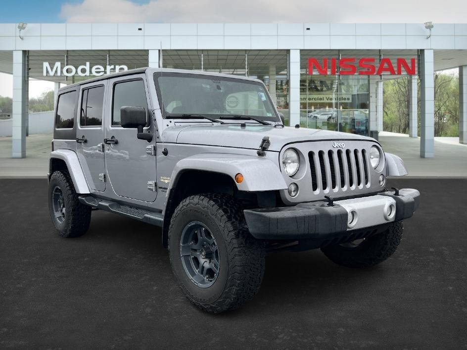 used 2014 Jeep Wrangler Unlimited car, priced at $19,393