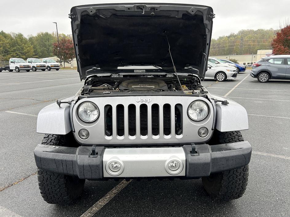 used 2014 Jeep Wrangler Unlimited car, priced at $19,393