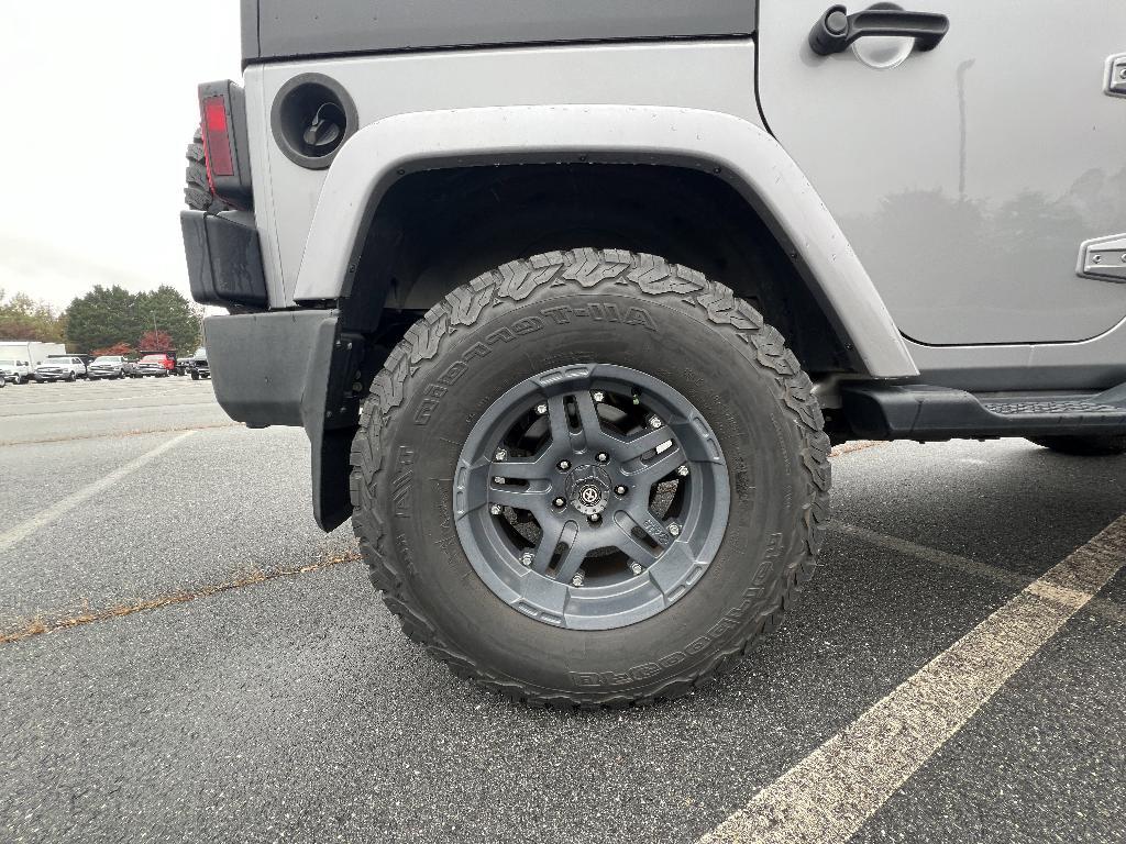 used 2014 Jeep Wrangler Unlimited car, priced at $19,393