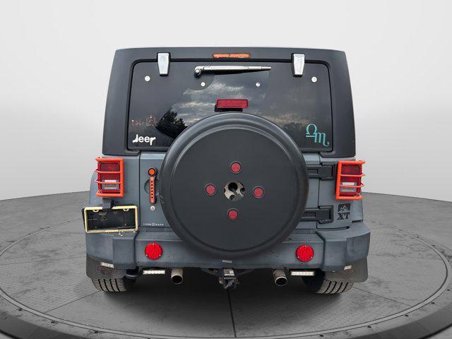 used 2014 Jeep Wrangler Unlimited car, priced at $17,994