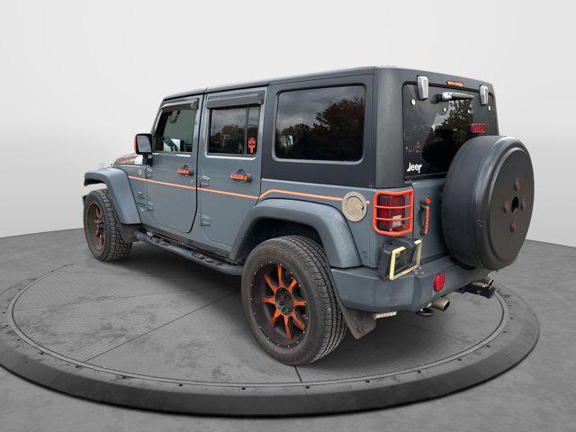 used 2014 Jeep Wrangler Unlimited car, priced at $17,994